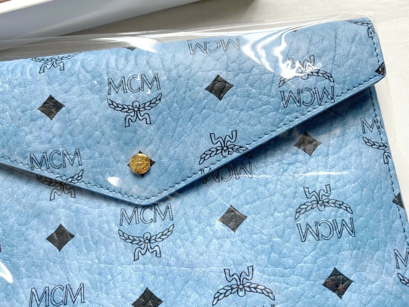 MCM visetos monogram envelope pouch clutch for rabbit key charm bag backpack