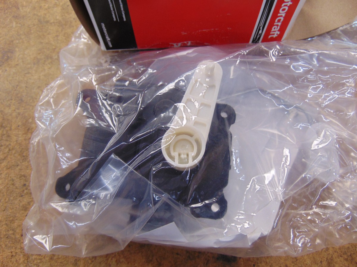 New OE Ford Motorcraft RH Blend Door Actuator, 7T4Z19E616C, Ford