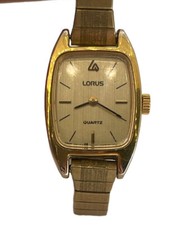 Vintage Lorus Quartz Women's Watch V235-5060 RO Gold Tone Stretch Band USA Made