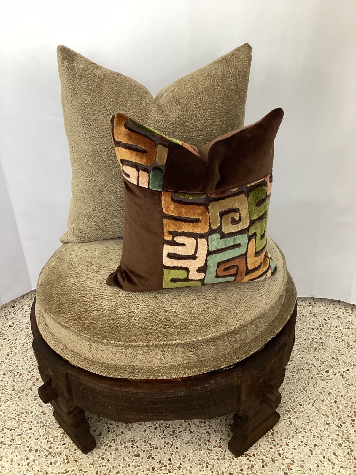 Custom Donghia fabric covered Chakki ottoman with reversible cushion and pillows