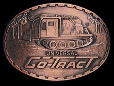 UE13125 NOS VINTAGE 1970s  UNIVERSAL GO-TRACT  ADVERTISEMENT BELT BUCKLE