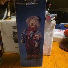 VINTAGE-MOVING MUSICAL-ANIMATED WIND-UP CLOWN-PLAYS "TOYLAND"