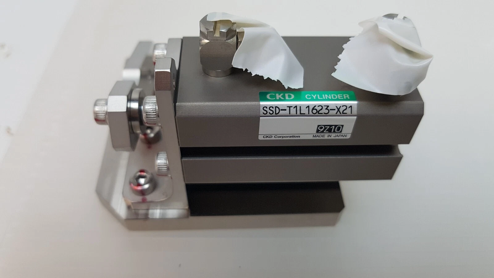 CKD cylinder label SSD-T1L1623-X21, lot 9Z10, made in Japan, on the air cylinder assembly