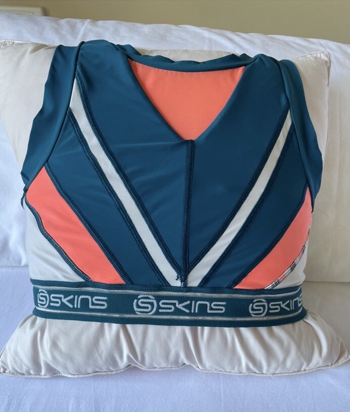 SKINS SPORTS BRA. Green & Flouro Orange. Size Large.