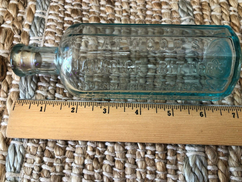 ANTIQUE ATWOOD'S JAUNDICE BITTERS GEORGETOWN MA CLEAR EMBOSSED GLASS BOTTLE 6" H