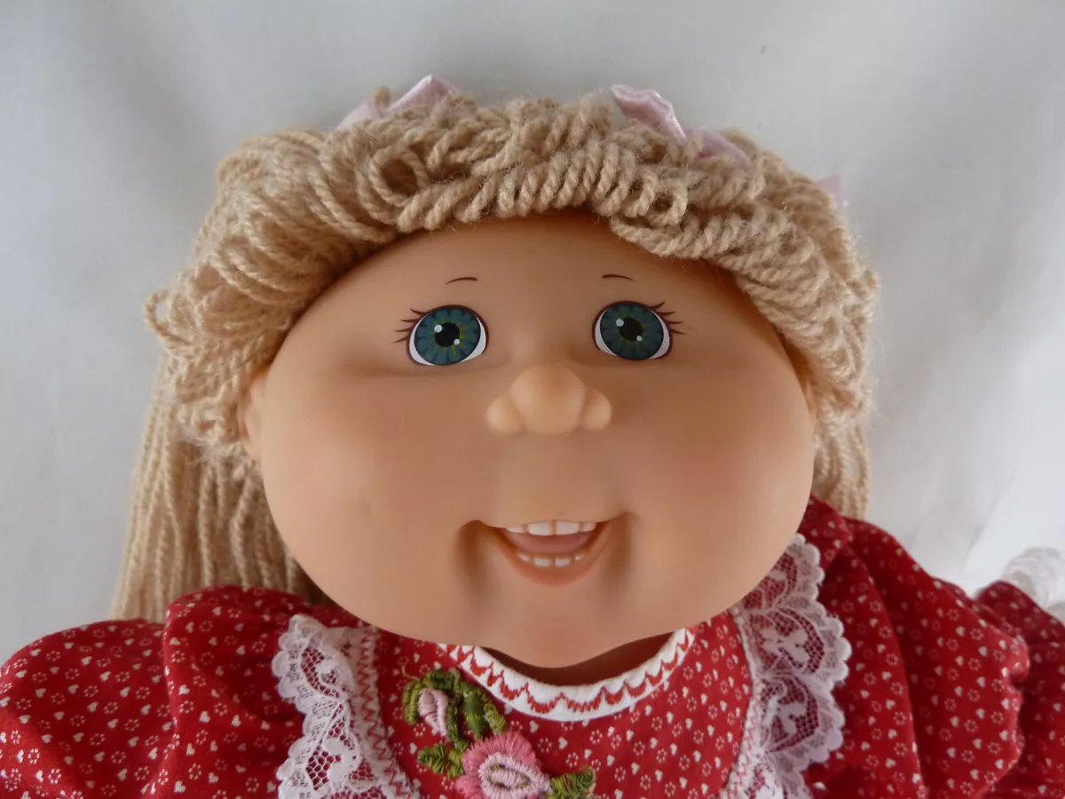 Cabbage patch doll with sales teeth