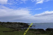 Photo 6x4 Rocks at Ardbeg Ardbeg/NR4146 The rocky shore to the west of A c2015