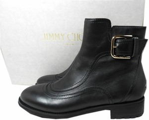black flat buckle boots