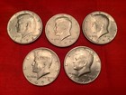 Lot of 5,  3- 1972 Kennedy half dollars and 2-1973 Kennedy half dollars. — photo 1
