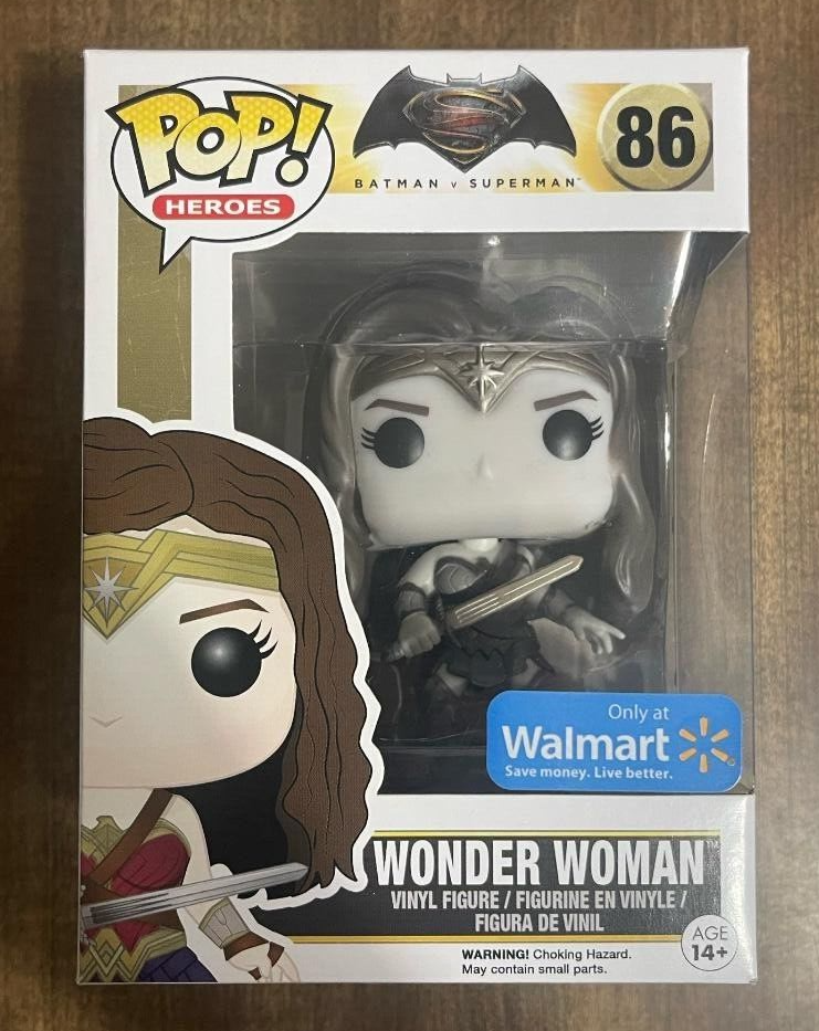Three Wonder Woman Pop Vinyl Figures: #86, #86 WalMart Variant, #172 in red/gold armor.