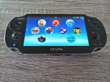 Sony PlayStation Vita Black Handheld Gaming System Comes With 4 Games & Charger