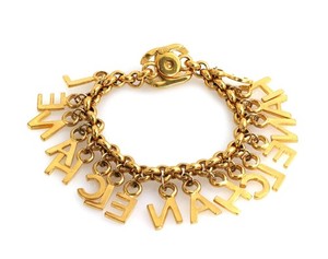 Authentic Chanel CC 1996 Multi-Letter Turnlock Gold Plated Charm Bracelet