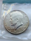 1980  Kennedy Half  Dollar  In Mint Cello with Beautiful toning