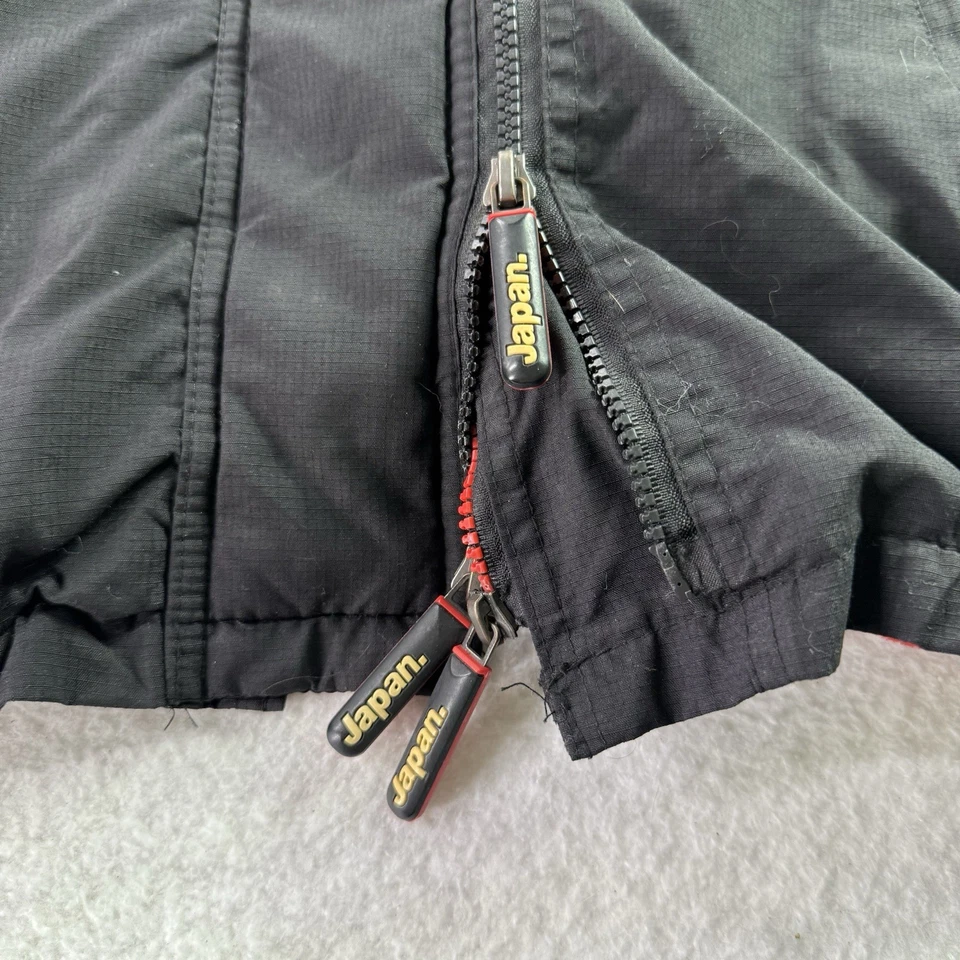 CHAQUETA ABRIGO NEGRA GRANDE SUPERDRY WINDCHEATER PROFESIONAL MULTI CREMALLERA INFORMAL PARA HOMBRE Foto 3 de 4