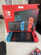 Nintendo Switch 32 Go Console Portable - Rouge Néon/Bleu Néon