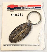Vintage 1980s Chevrolet Commitment to Excellence Return Postage Key Chain