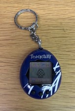 Original 1997 Tamagotchi dark blue, white stripes Bandai vintage virtual pet