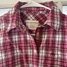 Vintage aeropostale Stretch, Long Sleeve, Plaid with hit on front pocket.