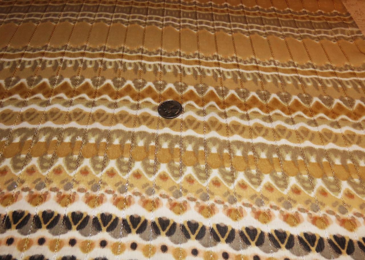 Echo oblong scarf; abstract; tan white black; metallic accents; poly; 72x20 in.