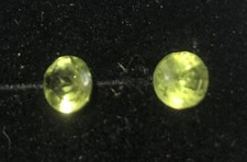 Péridot naturel d'Afrique 0,71 carats taille ronde (2 pierres rondes)