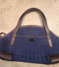 Vera Bradley Round Quilted With Brown Leather Trimmed Carryon Bag