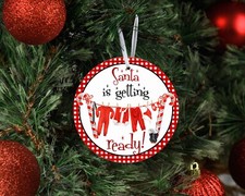Santa is Getting Ready Laundry Ceramic Christmas Ornament