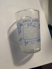 2 North Dakota Souvenir Shot Glass Toothpick Beef Breadbasket State Capitol FLAG