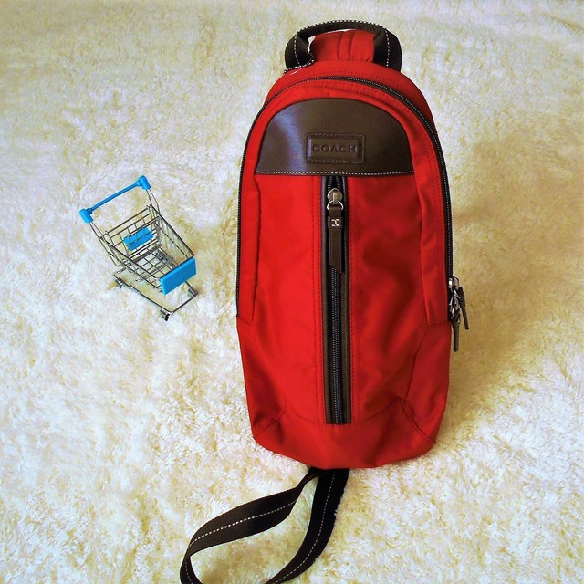 coach red sling bag