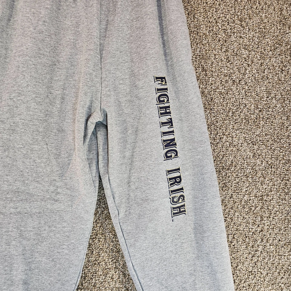 Pantalones deportivos vintage Champion Fighting Irish para hombre grandes 32x30 bolsillos grises NUEVO Foto 2 de 4