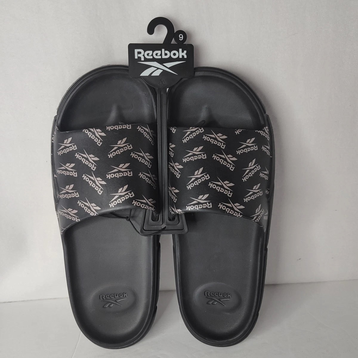 Reebok Donna Scivoli neri Logo oro rosa