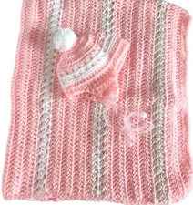 Crocheted pink baby blanket / throw with matching cap