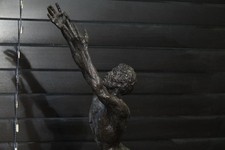 24  1969 Thomas Holland Bronze of Man reaching 4/10