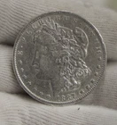 1887 O  US Morgan Dollar $1 XF (Cleaned).....