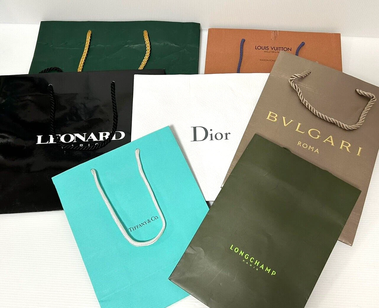 Lot de 7 sacs en papier de marque Louis Vuitton Rolex LEONARO Dior Bulgari LONGCHAMP Tiffany