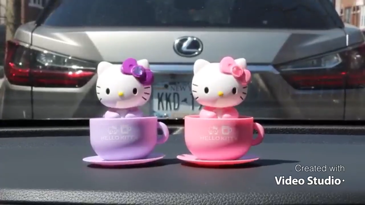 Pink Hello Kitty Moving Head Solar Car Decoration | eBay