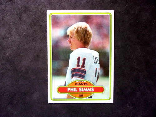 ROOKIE 1980 TOPPS #225 PHIL SIMMS,,NO CREASES,,TINY INDENT BEHIND HEAD..GIANTS