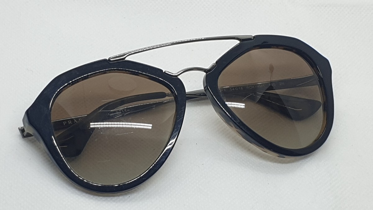 Prada SPR 12Q-A ROK-4M1 Sunglasses Size 54-18-135. Made in 