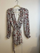 Express Flirty and Fun Floral Romper with Long sleeves Size XS