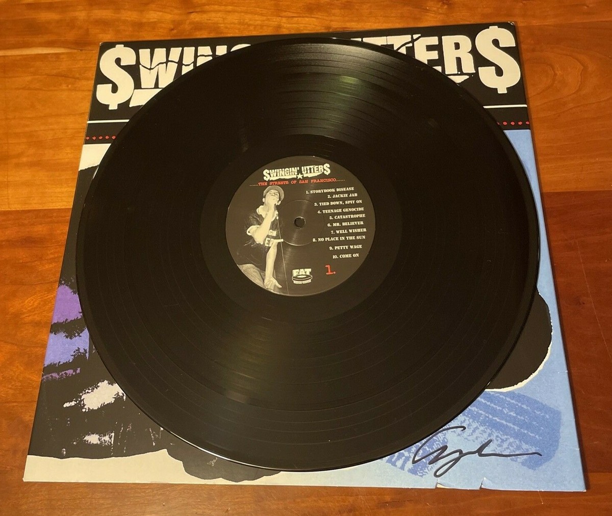 Swingin Utters Streets Record Signed by Johnny “Pee Bux