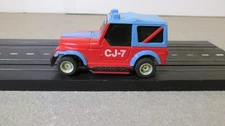 1980-81 6905 Tyco Jeep CJ-7 Red/Blue Lighted HP2 Chassis-Runs-Doesn’t Light