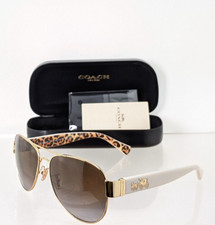 Brand New Authentic Coach Sunglasses HC 7059 9249T5 Gold Ivory Wild Beast 58mm