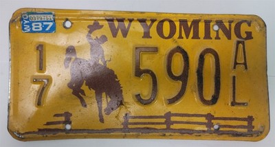 Wyoming License Plate 17-590-AL , Yellow Bucking Horse , 87 Tags 