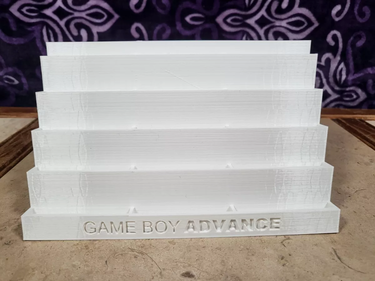 GAMEBOY ADVANCE STAND WITH 5X GAME CARTRIDGES HOLDER