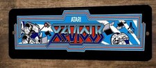 a Xevious 4x12 Metal Wall Video Game Arcade Sign Poster