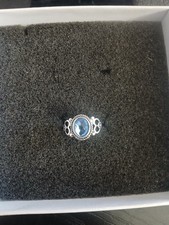 size 5 ring ,silver tone with a beautiful stone
