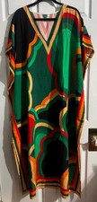 Roper Romp Complete Costume. Orange curly wig, bold green kaftan robe, jewelry