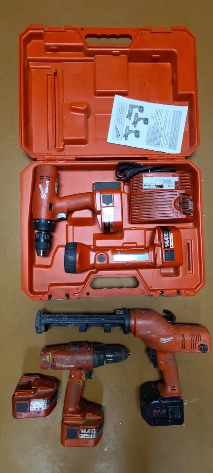 Milwaukee 14.4V Tool Set 2 Drills Caulk Gun Light 6 Batteries 2 Chargers Case - Image 2 of 4