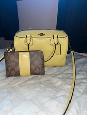 Yellow Coach bag with matching coin purse 