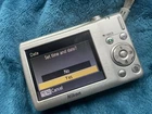Nikon COOLPIX S203 3x Zoom Digital Camera - Silver Working Battery & charger