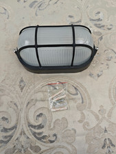 Knightsbridge TPOV60B IP54 Oval Bulkhead Lamp with Wire Guard and Glass Diffuser